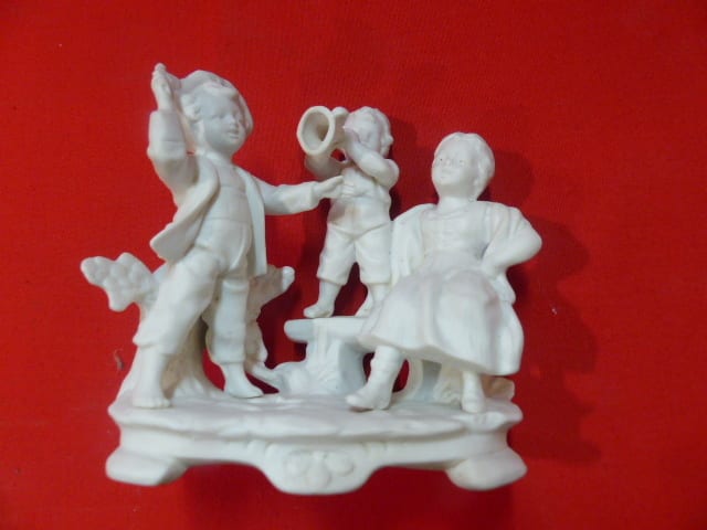 biscuit 3 enfants  long 13 haut 12 prof 8 cm