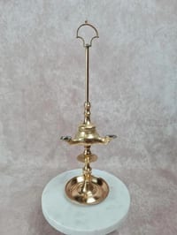 Ancien bougeoir / lampe à huile en laiton